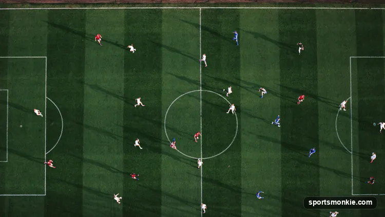 Tactical diagram of the 3-5-2 formation showing three center-backs, two wing-backs, a midfield three and two strikers