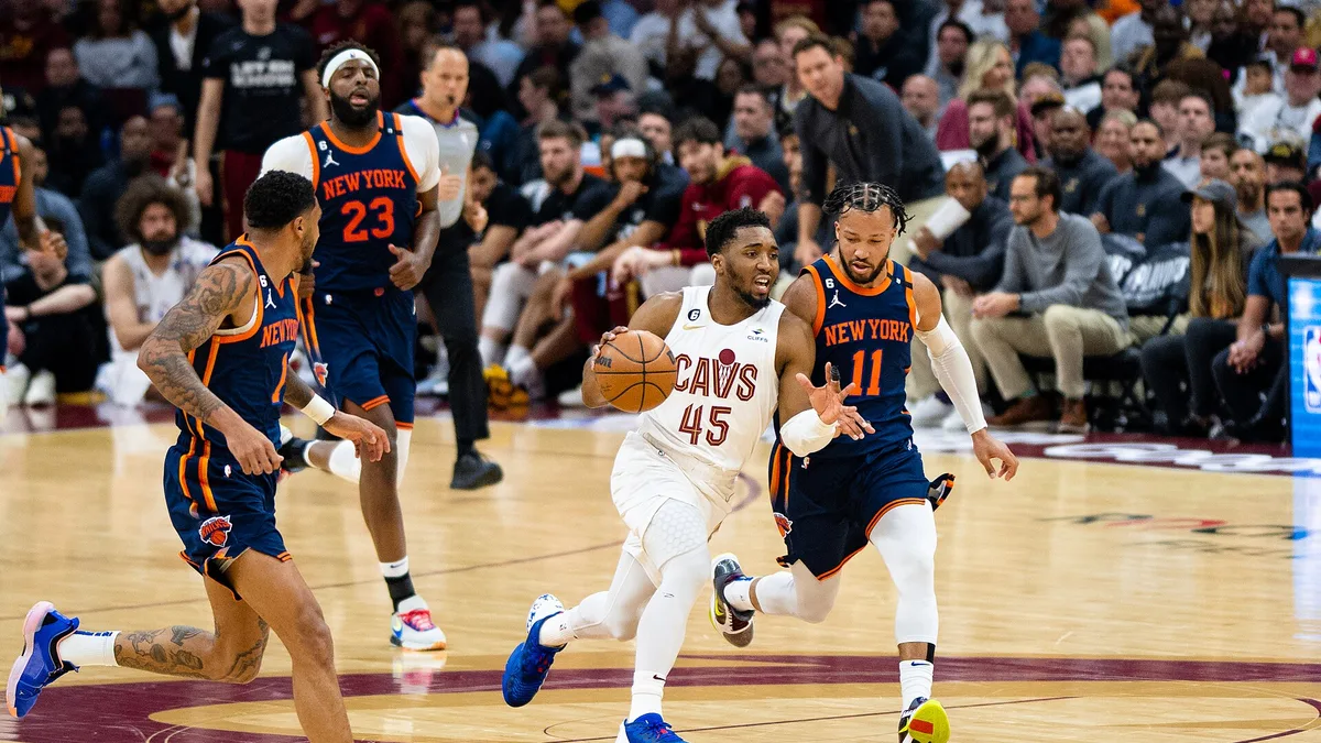 File photo from April 2023: Jalen Brunson, in a New York Knicks uniform, defending Donovan Mitchell during a playoff game in Cleveland. It does not show the Minnesota preseason game.