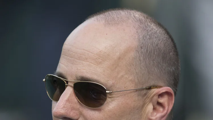 File photo from June 12, 2015: Yankees general manager Brian Cashman at Baltimore on a Yankees at Orioles day. It does not show Wednesday's press conference or the 2026 team. The 16:9 cropped derivative is offered under the same CC BY-SA 2.0 licence as the original.
