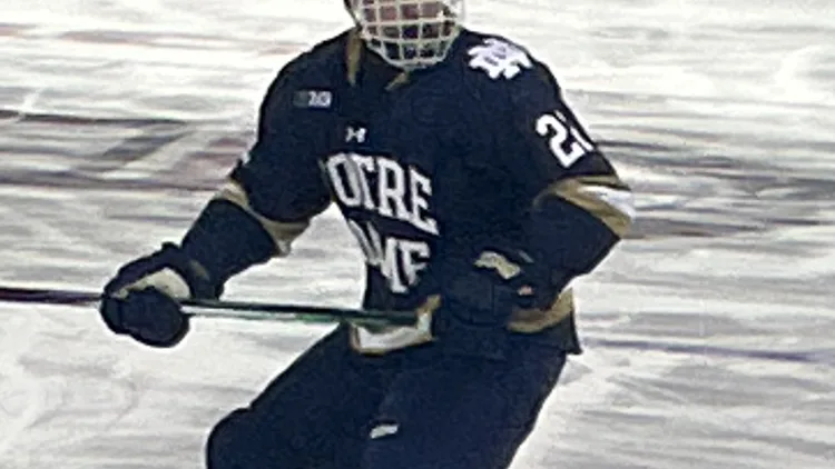File photo from February 2024 of Cole Knuble playing for Notre Dame against Wisconsin. It does not show his NHL debut for the Flyers. The 16:9 cropped derivative is offered under the same CC BY 4.0 licence.