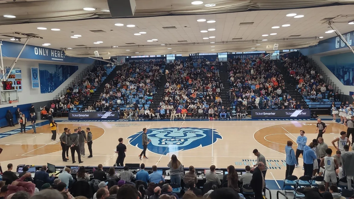 File photo from 20 January 2024: Levien Gymnasium during a timeout, Columbia's home court with the Lions logo at centre court. It does not show Megan Griffith or any game she will miss.