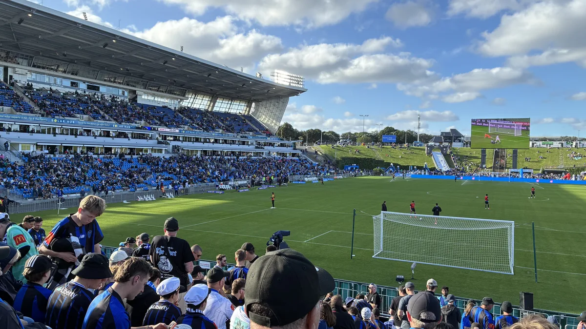 File photo from 25 October 2025: Go Media Stadium during an Auckland FC home game, with home supporters in blue and black in the foreground. It does not show Sam Cosgrove or Thursday's press conference.