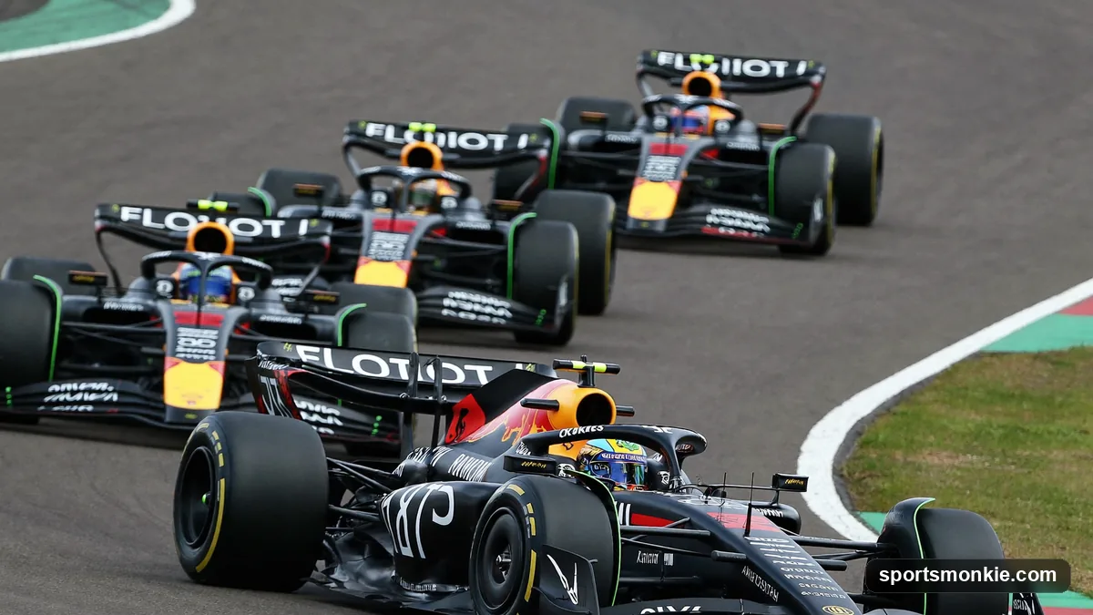 A Formula 1 grid pulling away on the formation lap with cars weaving to warm their tyres