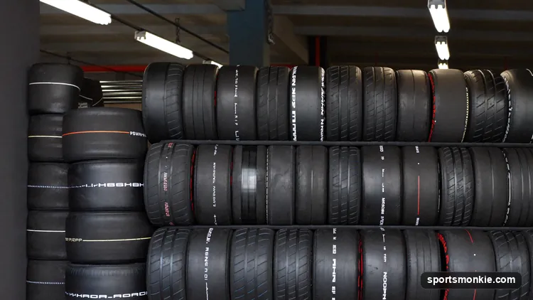 A set of Pirelli Formula 1 tyres showing the white, yellow and red sidewall colour markings