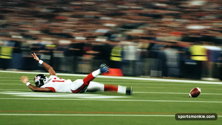 Football prospect sprinting an electronically timed 40-yard dash