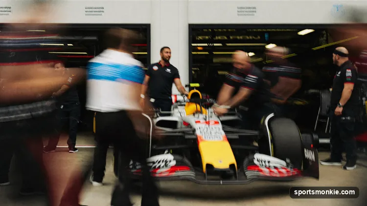 A McLaren Formula 1 pit crew completing a sub-two-second tyre change during a race