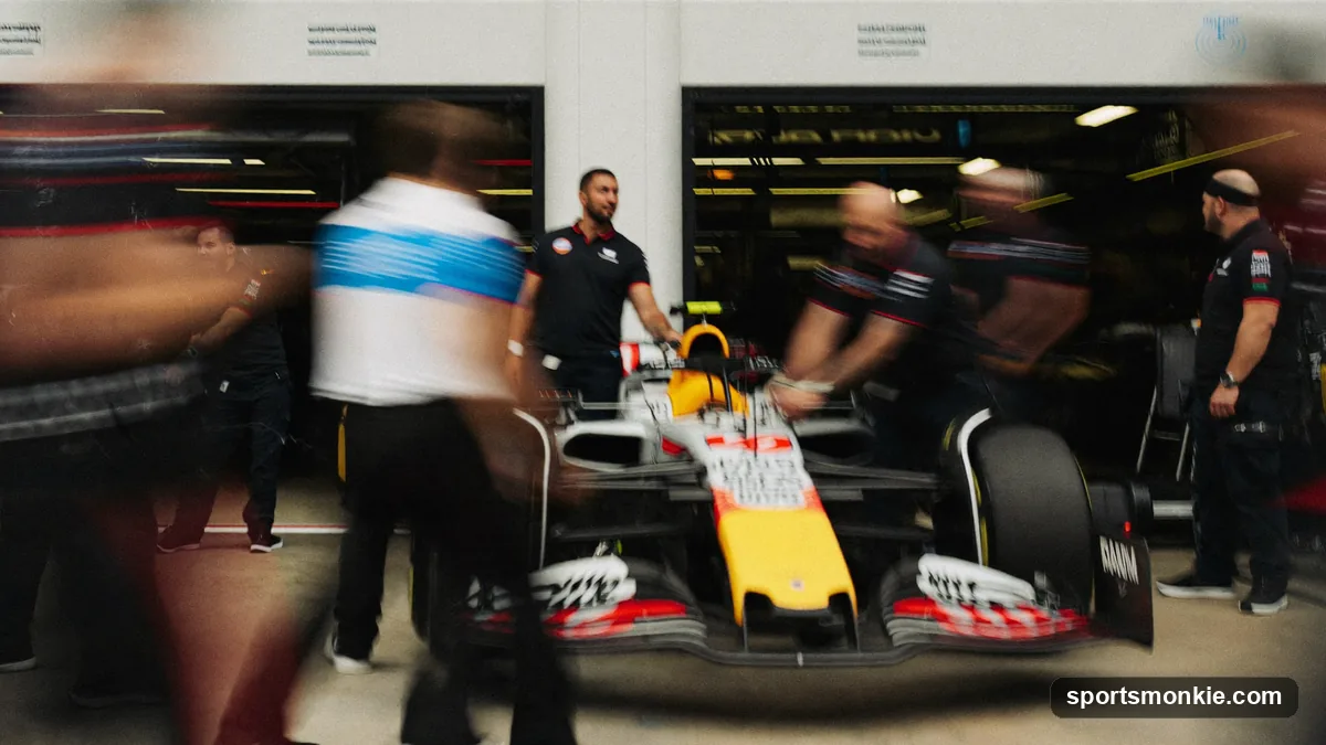 A McLaren Formula 1 pit crew completing a sub-two-second tyre change during a race