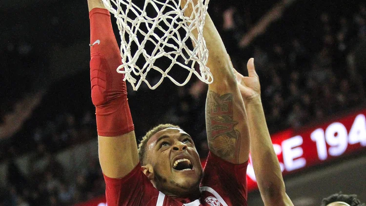 File photo from 9 February 2019: Daniel Gafford dunking for Arkansas. It was not taken at the Mavericks-Heat game and does not show the shoving match with Bobby Portis.