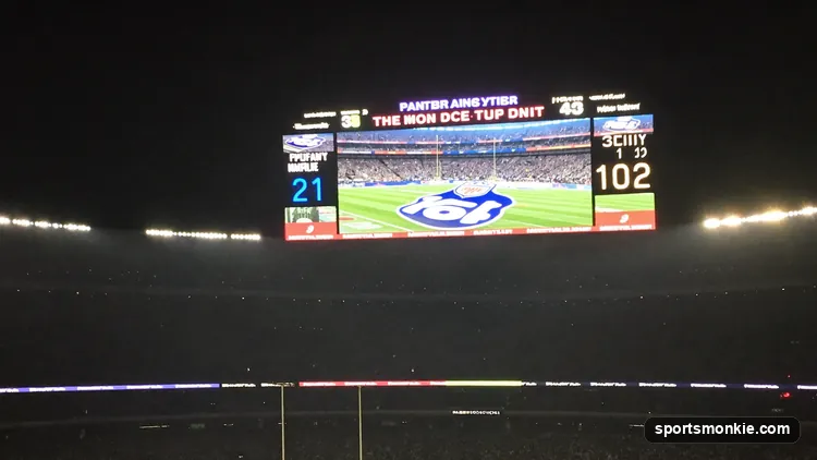 Vintage-style NFL scoreboard showing a lopsided high-scoring final total under stadium lights