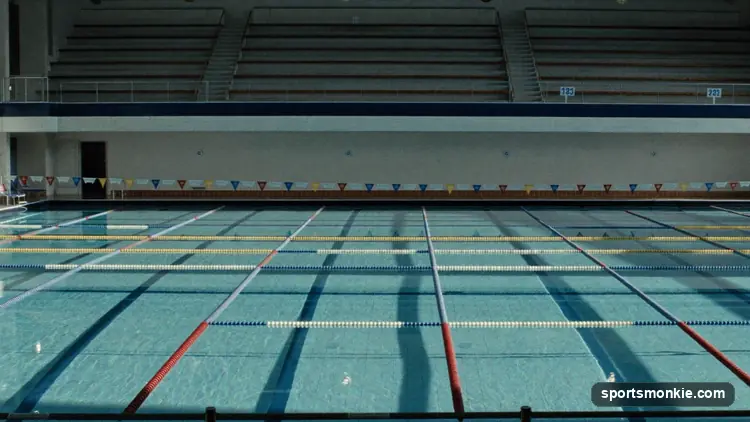 Diagram of an Olympic swimming pool showing 50 meters long, 25 meters wide, and 10 lanes