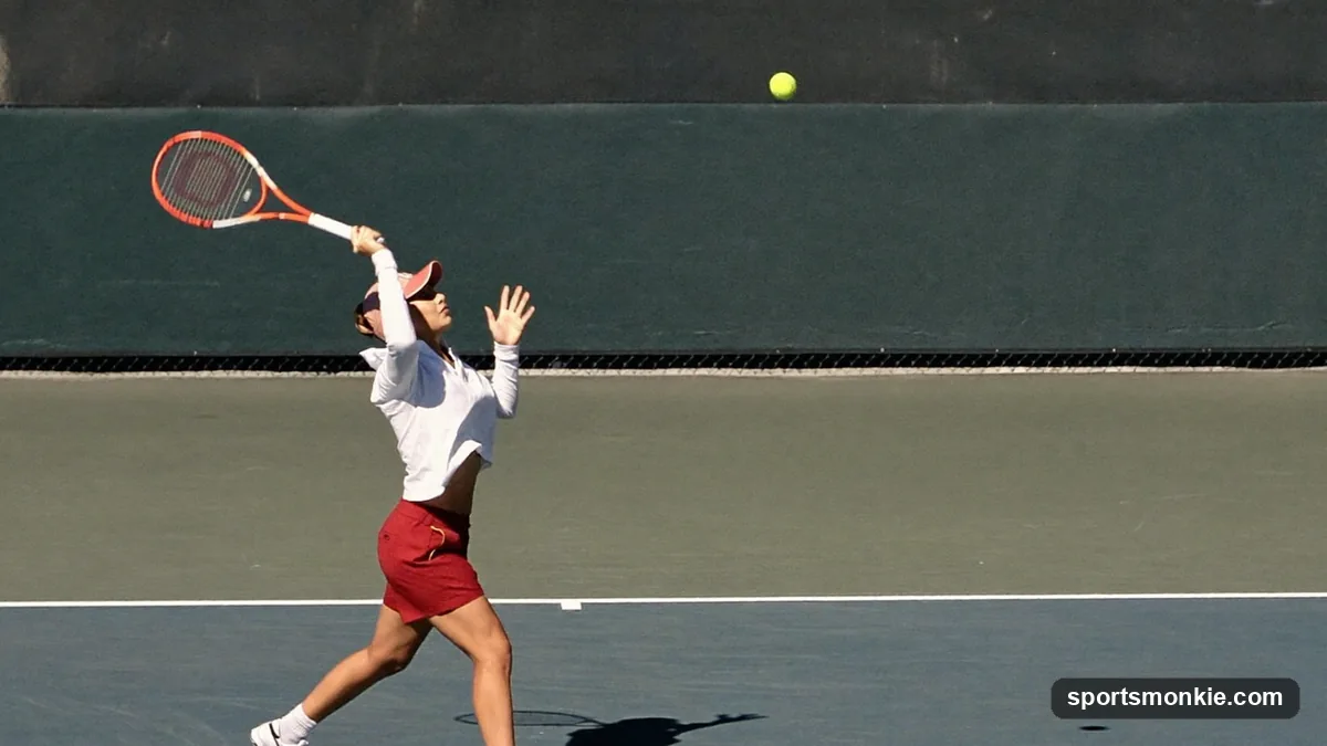 Tennis player hitting a high arcing lob shot over an opponent at the net