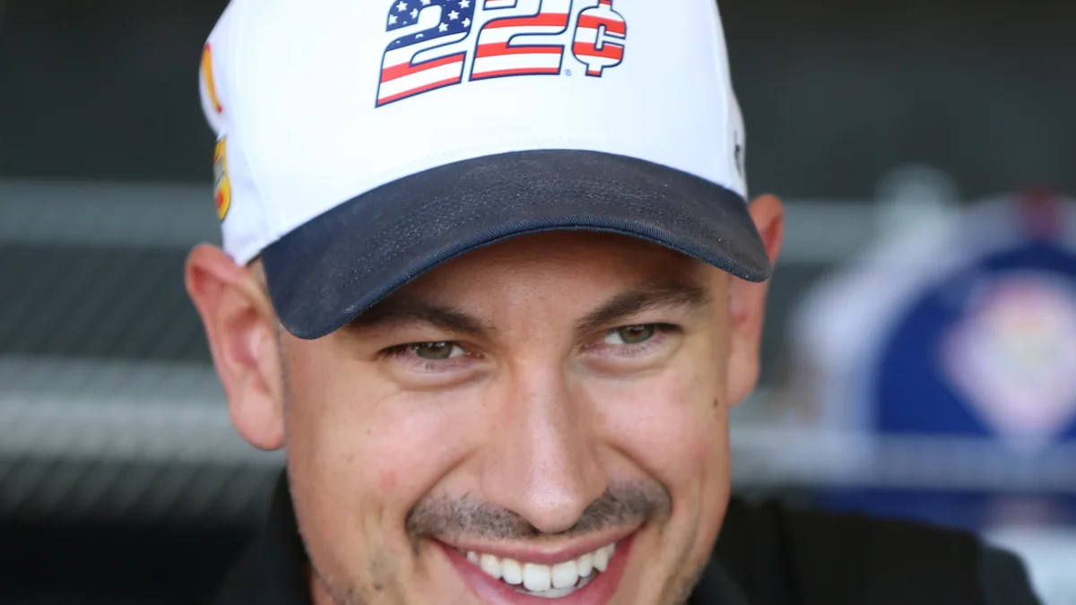 File photo from 2 October 2026: Joey Logano smiling in his No. 22 cap at Las Vegas Motor Speedway. It was not taken at Talladega and does not show the crash.