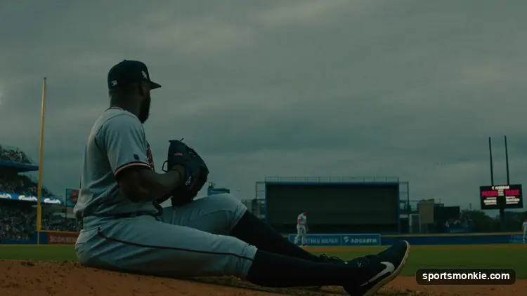 Baseball pitcher on the mound preparing to throw during a game