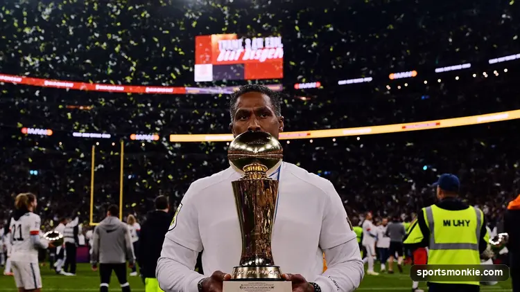 Vince Lombardi Trophy silhouette under stadium lights