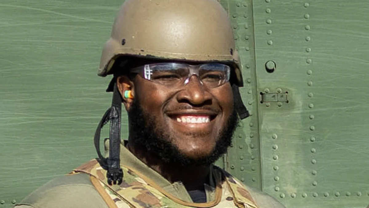 File photo from December 9, 2025: Dallas Cowboys guard Tyler Booker at Fort Sill, Oklahoma. It was not taken at the October 8 game against Tampa Bay. Public domain, US Government.