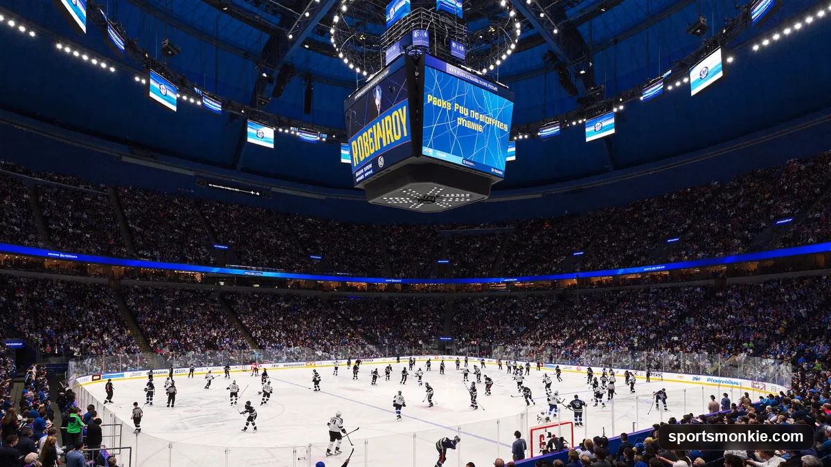 NHL arena during a game with an out-of-focus scoreboard, representing hockey finances
