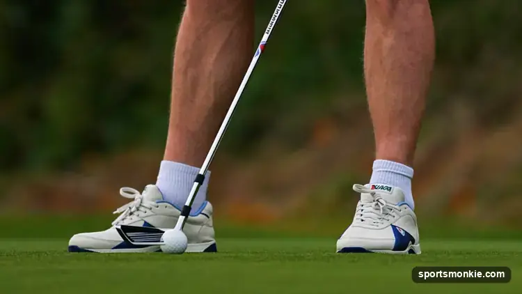 Down-the-line view of a golfer's club moving outside the swing plane on the downswing