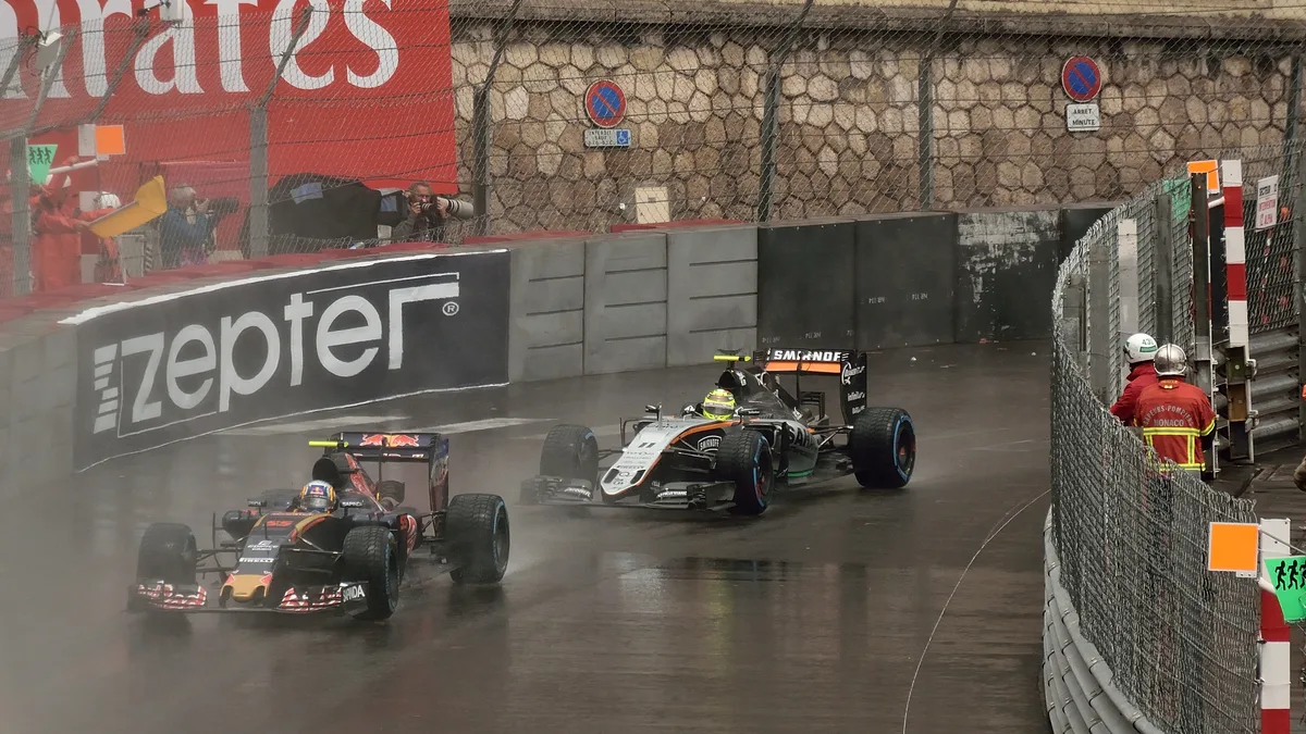 File photo from 29 May 2016: Sergio Perez's No. 11 Force India chases Carlos Sainz's Toro Rosso through the wet at Monaco. It was not taken at the Mexico City Grand Prix and does not show Perez's Cadillac.