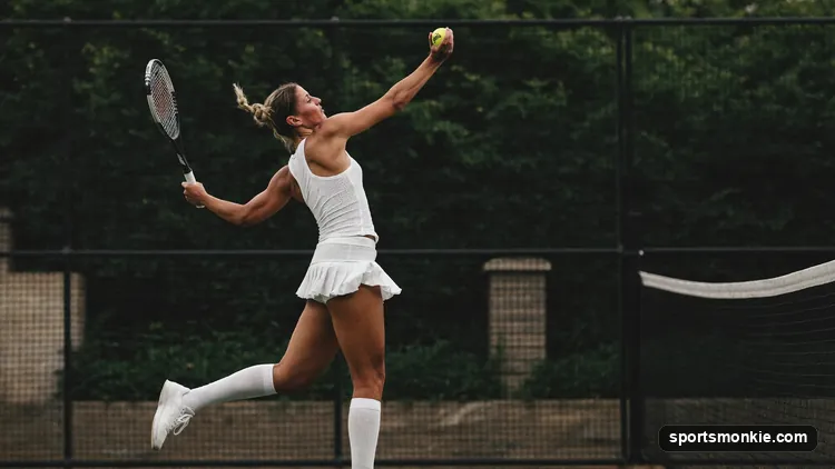 A pickleball player punching a compact volley at the kitchen line