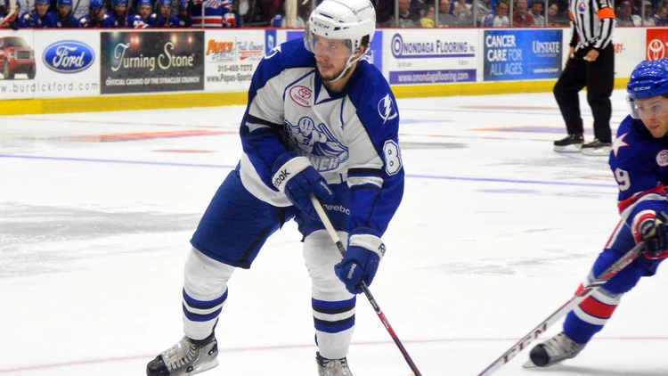 File photo from 12 October 2013: Nikita Kucherov skates with the puck for the Syracuse Crunch in the AHL. It was not taken at any Lightning game this season and does not show the trade request or the team's response.