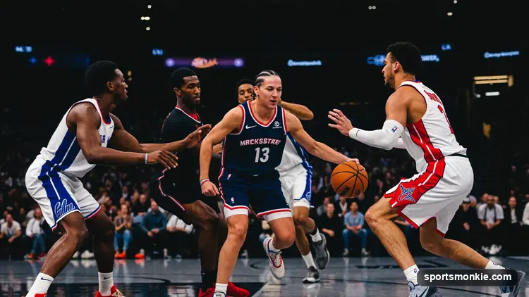 A short basketball guard dribbling past taller defenders on an indoor court