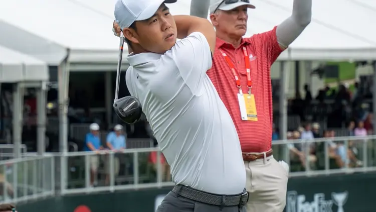 File photo from 18 June 2025: Tom Kim mid-swing at the Travelers Championship. It was not taken at the VidantaWorld Mexico Open and does not show the wrong-ball incident with Brian Campbell.