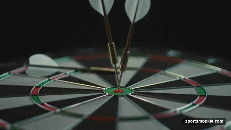 Three darts clustered in the treble 20 bed of a dartboard during a perfect leg