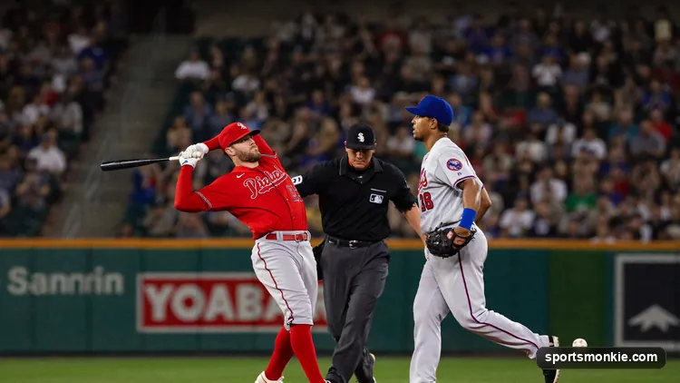 Shortstop turning a double play by throwing to first base after forcing out the runner at second