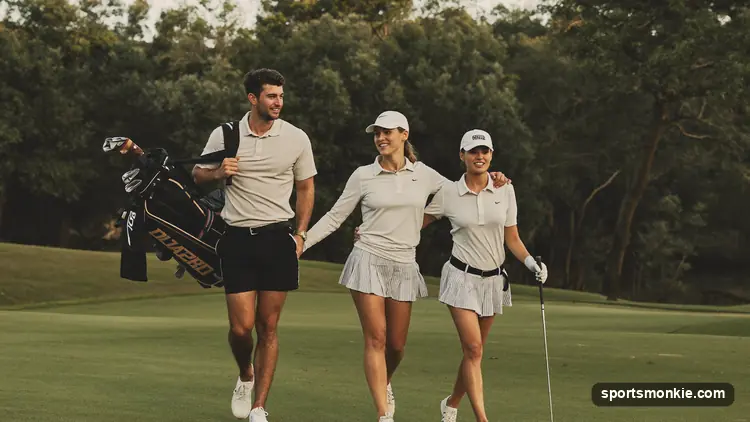 Professional golfer and amateur partner reading a putt together during a pro-am round