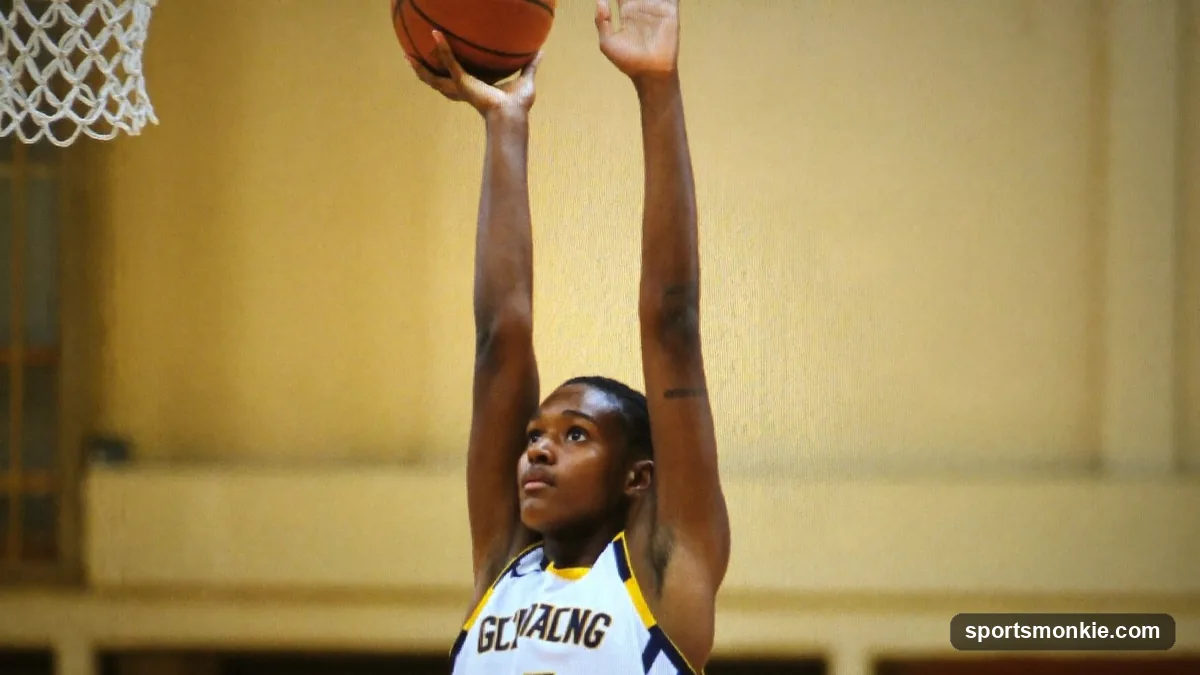 NBA shooting guard rising for a three-pointer off a screen on the perimeter