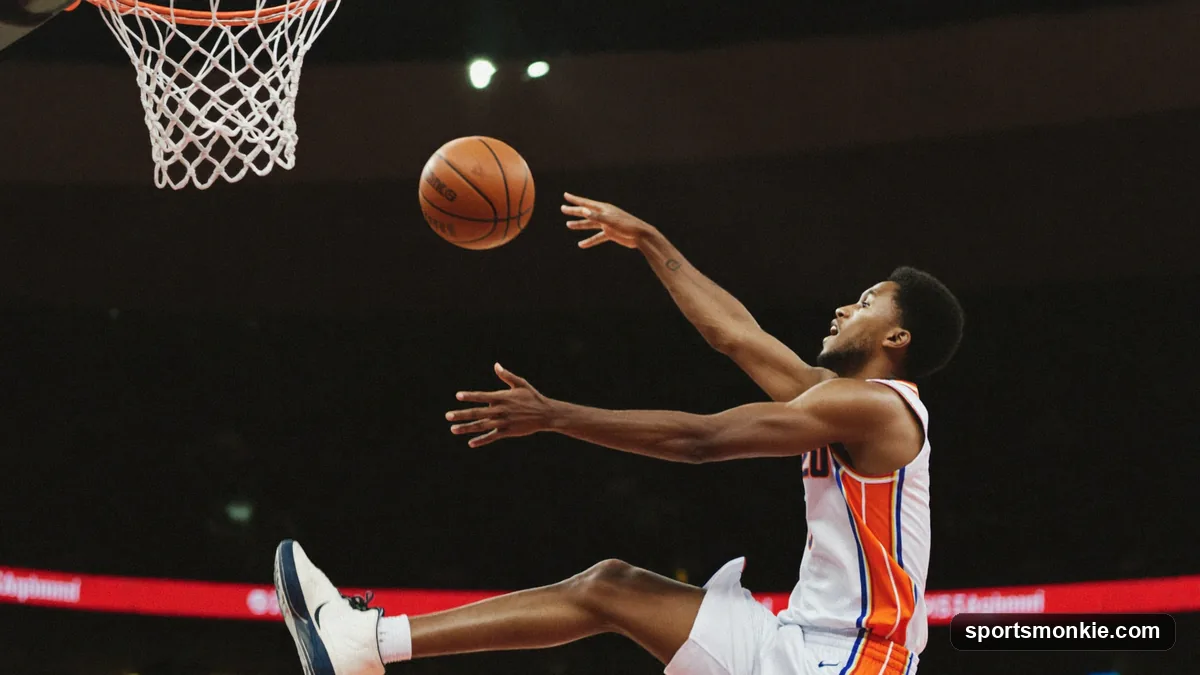 NBA player catching a lob pass above the rim to finish an alley-oop dunk