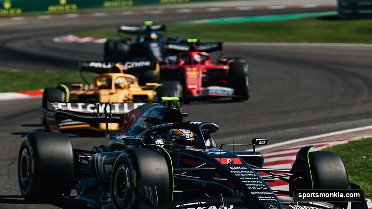 Formula 1 car leading the grid from pole position into the first corner of a race