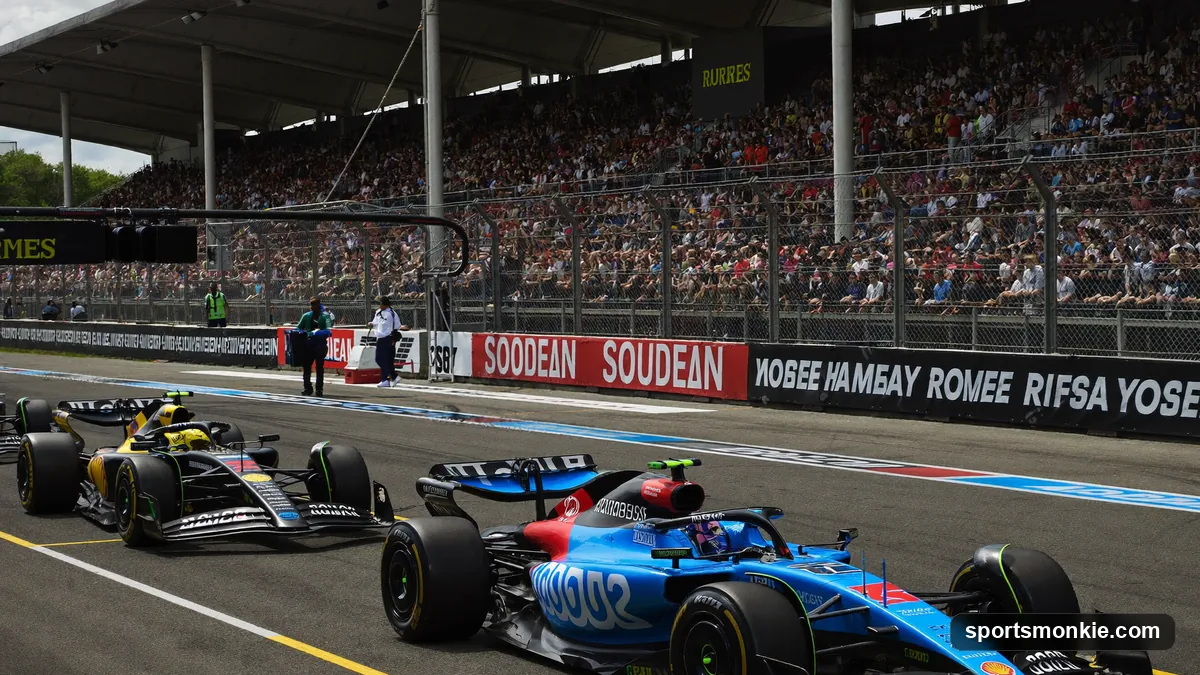 Formula 1 cars lined up on the grid for a Saturday Sprint race under bright daylight