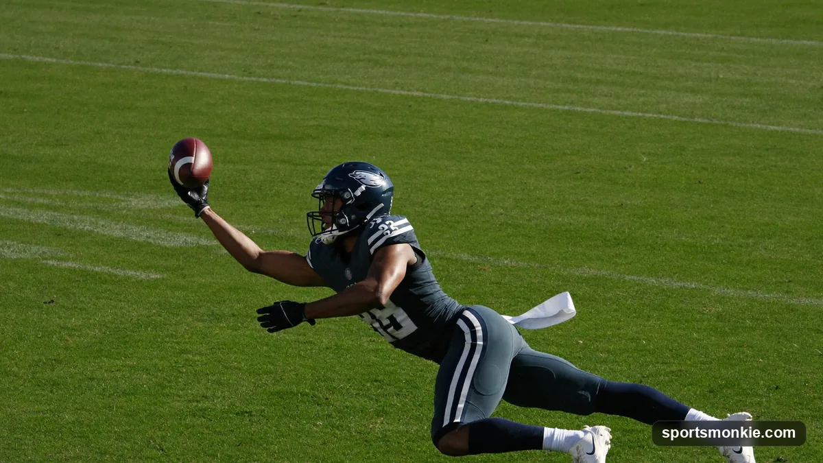 NFL wide receiver running a route downfield during a football game