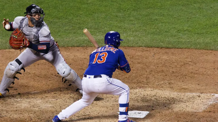 File photo from 6 August 2022: William Contreras, then with Atlanta, begins a throw from behind the plate. It does not show the 2026 NLCS or Willson Contreras's posts. Released under CC0.