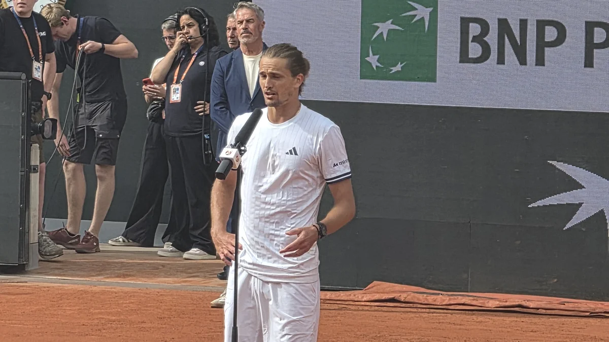 File photo from 31 May 2026: Alexander Zverev speaking on court at Roland Garros. It was not taken in Vienna and does not show the Griekspoor match or the No. 1 ceremony.