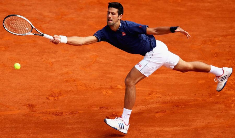 Novak Djokovic playing on clay court in Roland Garros